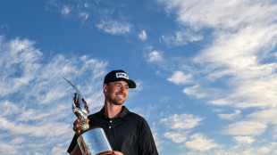 France's Perez holds on to claim Abu Dhabi title 