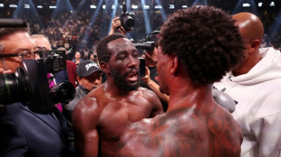 Crawford stops Spence to claim undisputed welterweight world title