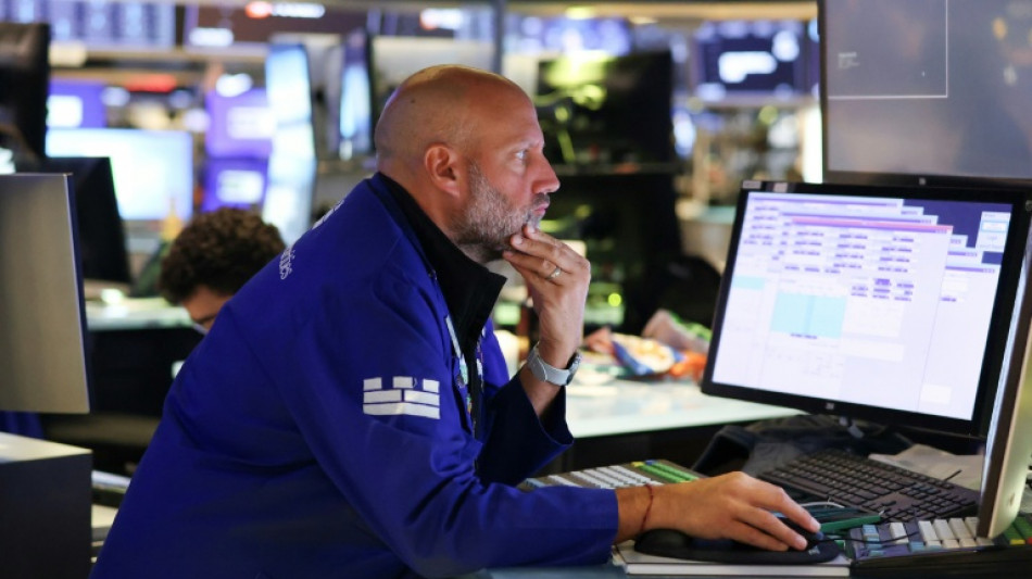 Wall Street clôture sans entrain après des données économiques en demi-teinte