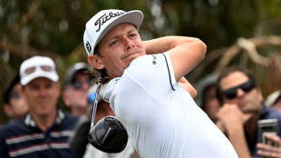 Smith struggles as Micheluzzi leads Australian Open