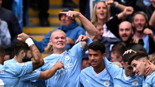 Ten-man Man City show silk and steel to extend Premier League lead