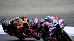 Pole-position 'Martinator' cuts MotoGP gap with sprint win