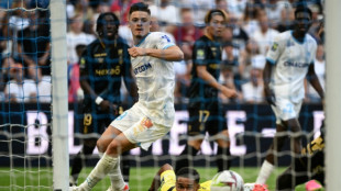 Marseille squeeze past Reims in Ligue 1 opener