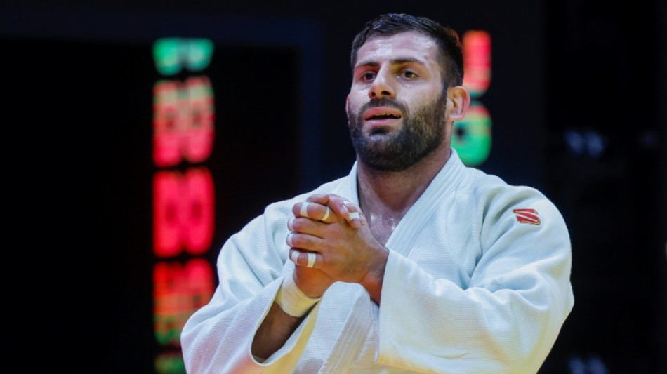Russia's Arman Adamian wins world judo gold under neutral flag
