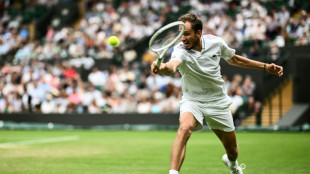 Medvedev defeats friend Fucsovics at Wimbledon