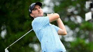 Late eagle lifts Henley to Wyndham lead as Scott starts strong