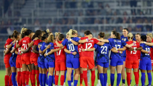 U.S beat Canada, Brazil's Marta makes winning return 