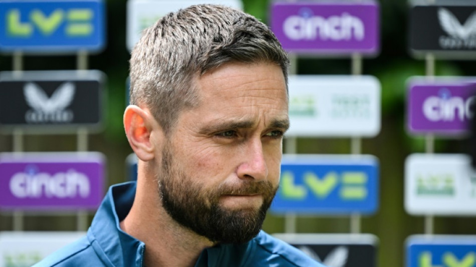 England's Woakes feared for Test future after knee injury