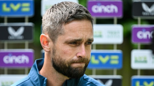 England's Woakes feared for Test future after knee injury