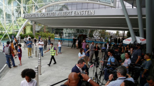 'Our greatest idol': Brazilians flock to hospital after Pele's death