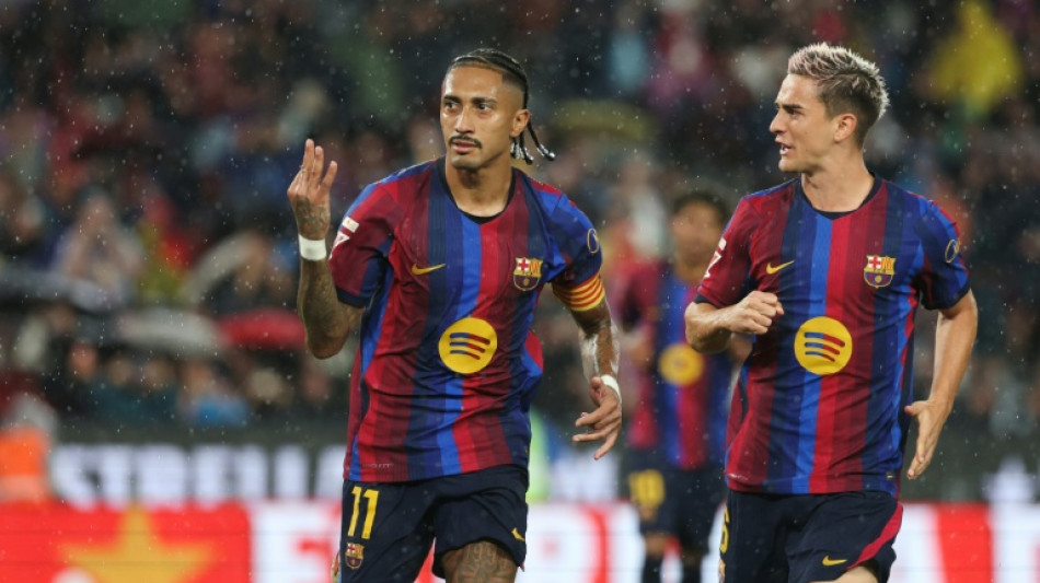 Barcelona hit seven in Racing Santander rout