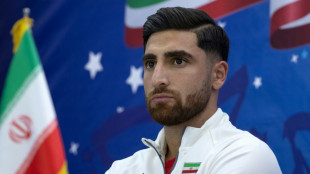 Germany arrive in Qatar as Iran shrug off protest talk