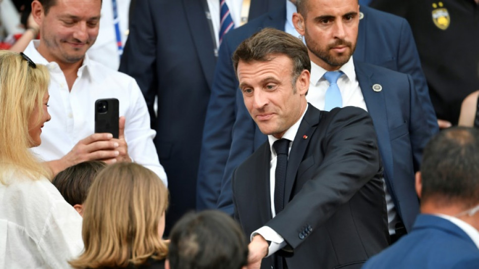Lager than life: Macron downs a beer to cheers, and criticism