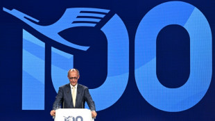 Merz praises Lufthansa on centenary as strikes ruin party