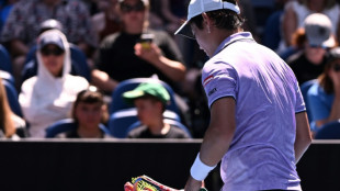 Khachanov wins 14 straight games to crush Nishioka at Australian Open
