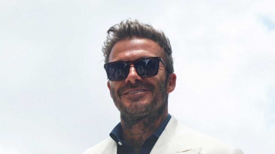 Loin des terrains de foot, Beckham une icône mondiale