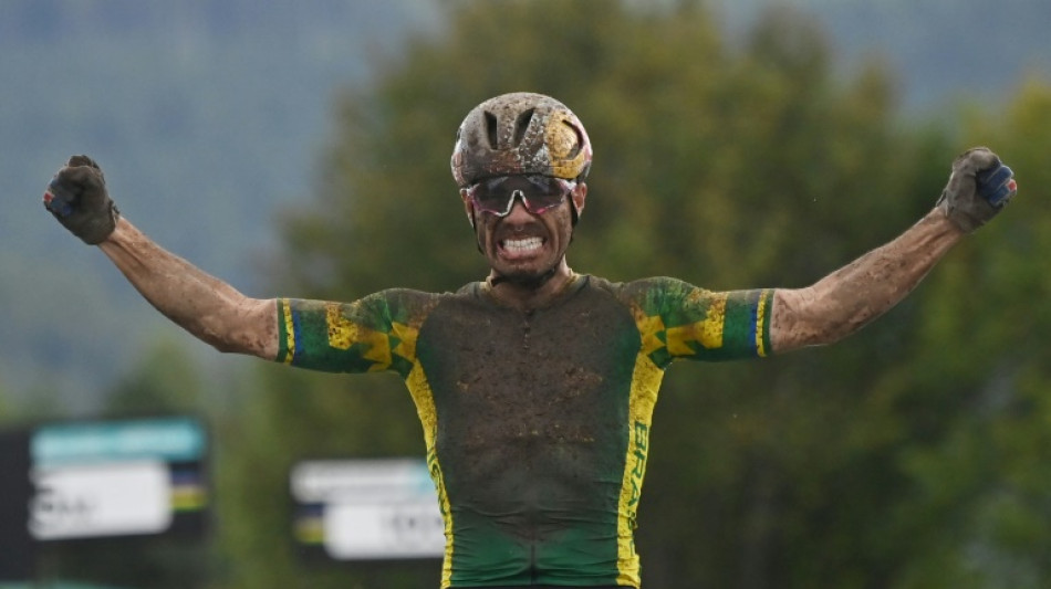 Mud and glory at world mountain bike marathon