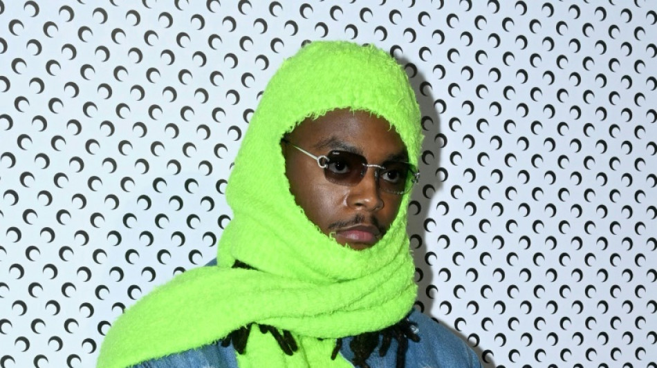Police question French rapper over drug baron's prison break