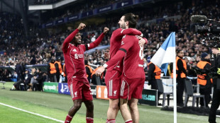 Liverpool cruise as Bayern reach Champions League last 16