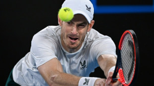 Murray wins Australian Open epic as Djokovic overcomes injury fear