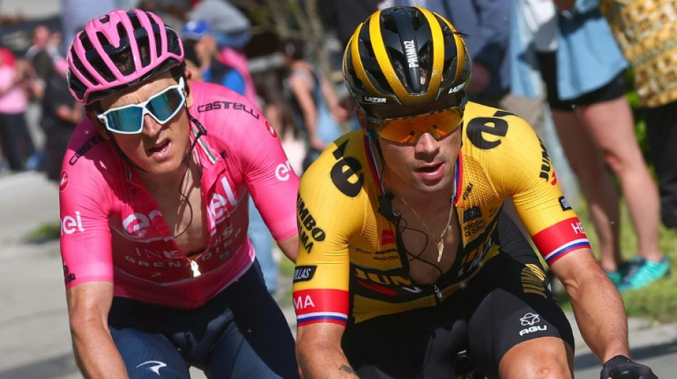 Birthday boy Thomas resists Roglic assault to stay in Giro pink