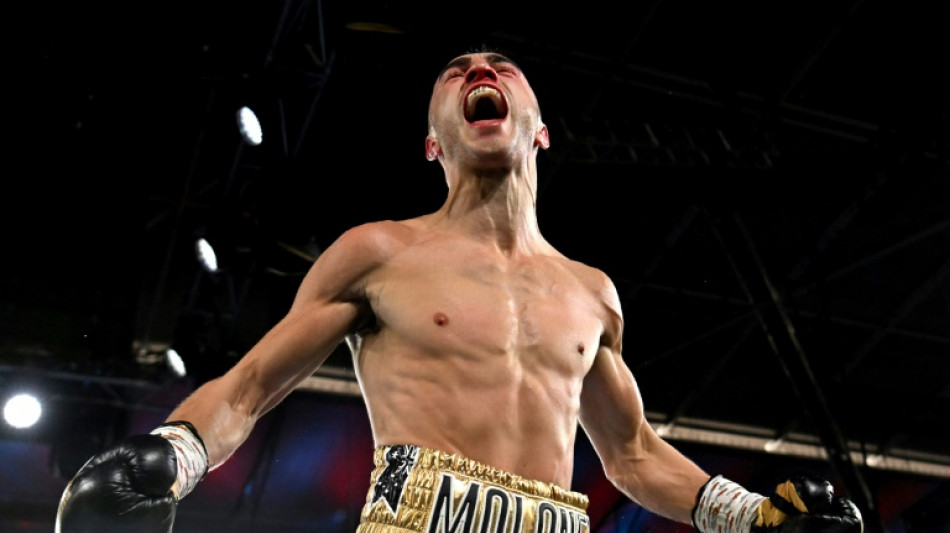 Aussie Moloney wins world crown while Alimkhanuly keeps title