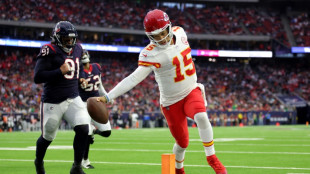Chiefs advance to NFL playoffs while Cowboys denied by OT loss