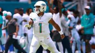 NFL Dolphins destroy Denver 70-20, Bills crush Commanders
