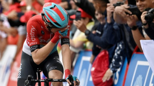 Kron grabs rainy Vuelta stage as Piccolo takes lead  