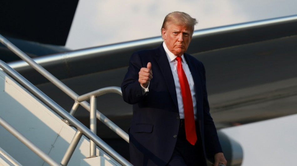 Trump arrested in racketeering case, mug shot taken