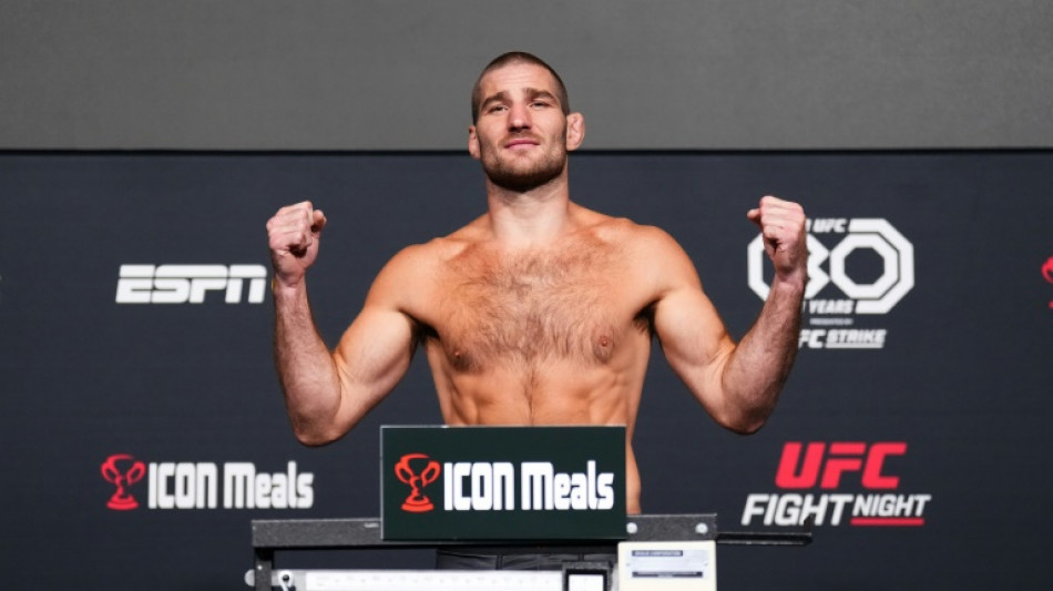 Strickland stuns champion Adesanya to win UFC middleweight title