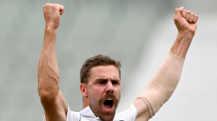 S. Africa make inroads in 2nd Test but Carey 50 keeps Australia on top