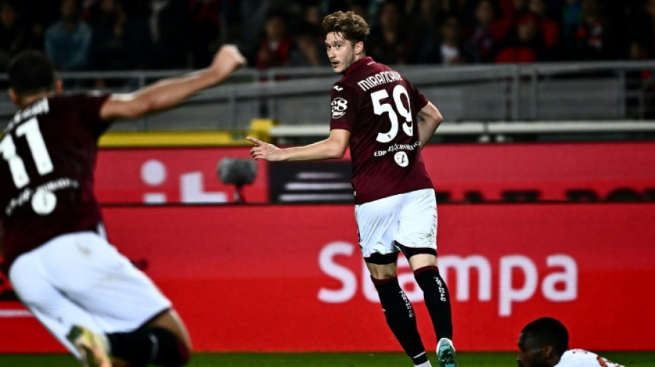 Torino beat Milan to hand leaders Napoli title advantage