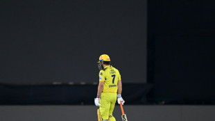 Dhoni doing 'well' after knee surgery - team