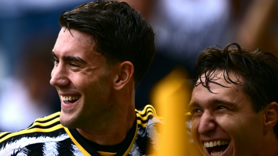Vlahovic double fires Juve top ahead of Milan derby