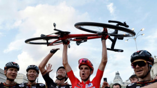 Vuelta champion Kuss says victory 'life-changing' as Jumbo-Visma make history