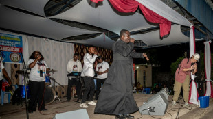 Prayer, psalms -- and rap: Kinshasa priest engages youth