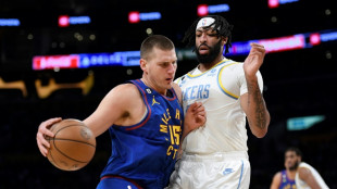 Lakers beat Denver for first triumph of NBA season
