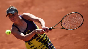 Svitolina fights back to reach French Open third round