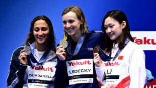 Ledecky shines as Popovici flops at swimming world championships