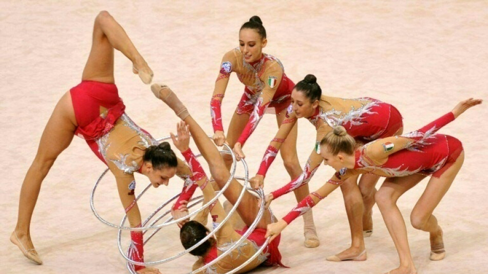 Italy's gymnastics chief gets off with warning after bullying claims