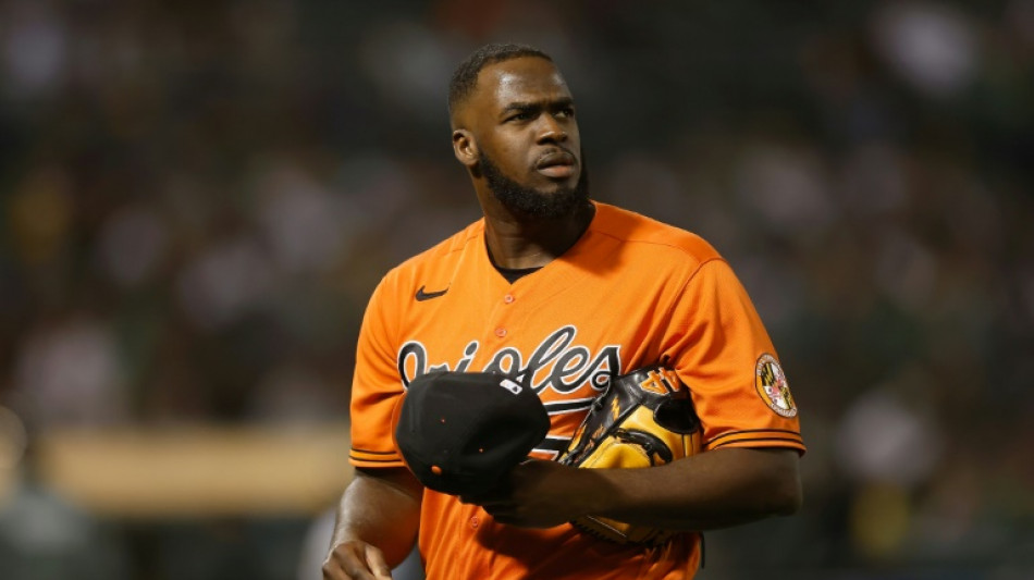 Sizzling MLB Orioles lose closer Bautista to elbow injury