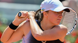 Swiatek sweeps into Italian Open last 16, Medvedev triumphs