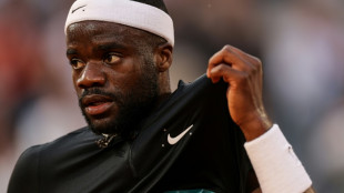 Tiafoe claims maiden grass court title and moves into top 10