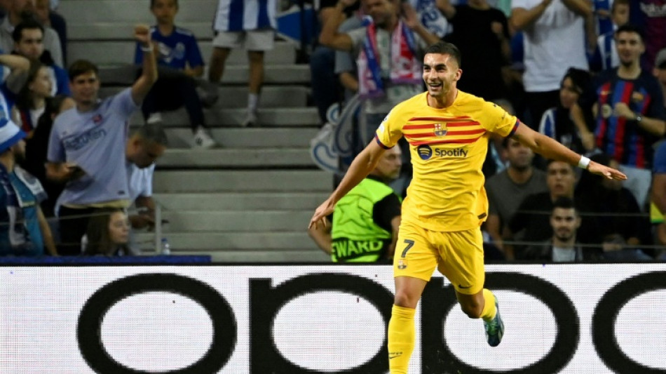 Torres scrapes Barca important win at Porto