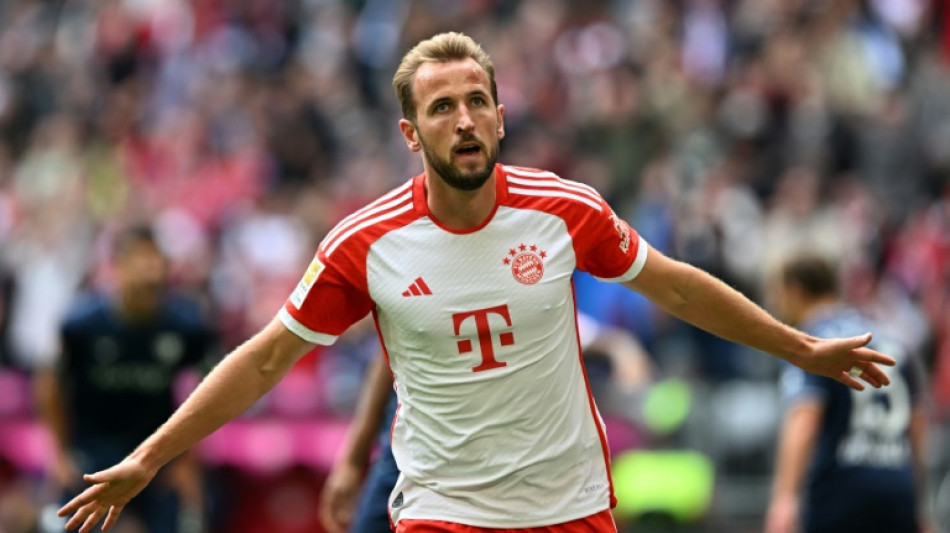 Record-setting Kane hits hat-trick as Bayern rout Bochum