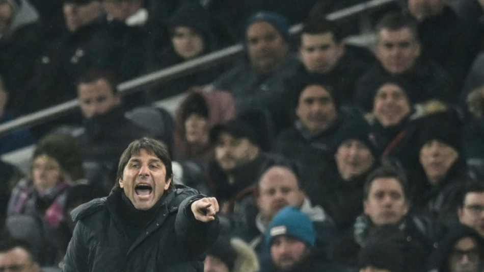 Milan hold off toothless Tottenham to reach Champions League quarters