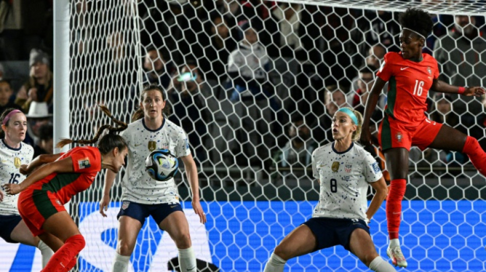 USA survive Portugal scare to reach World Cup last 16