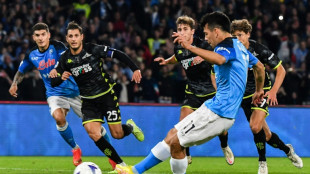 Napoli extend Serie A lead to eight points after Milan held at Cremonese