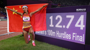China thrill in track and field but footballers flop again at Asiad